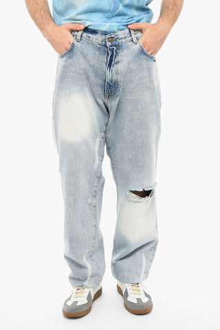 Light-washed Wide-leg Denims with Distressed Detailing
