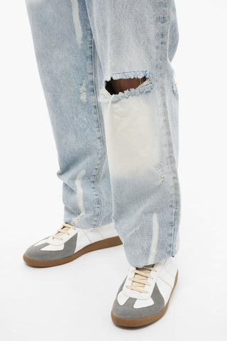 Light-washed Wide-leg Denims with Distressed Detailing