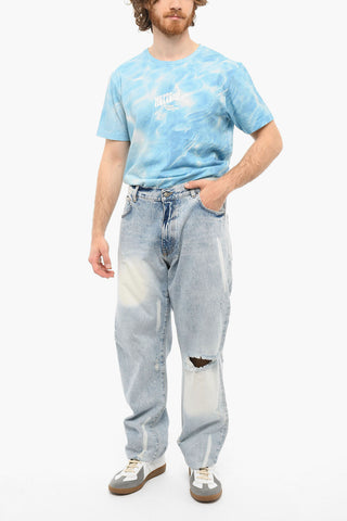Light-washed Wide-leg Denims with Distressed Detailing
