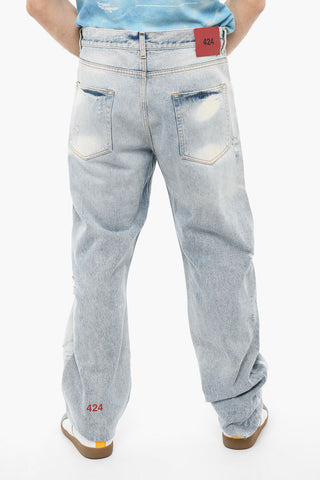 Light-washed Wide-leg Denims with Distressed Detailing