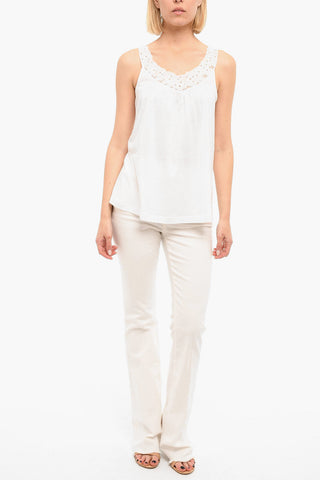 Sleeveless Top With Floral Neckline