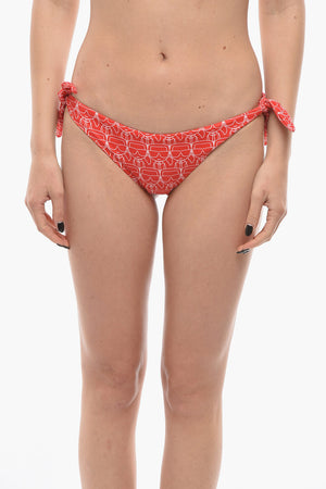 Bikinislip mit ikonischem All-over-Print und Bindebändern