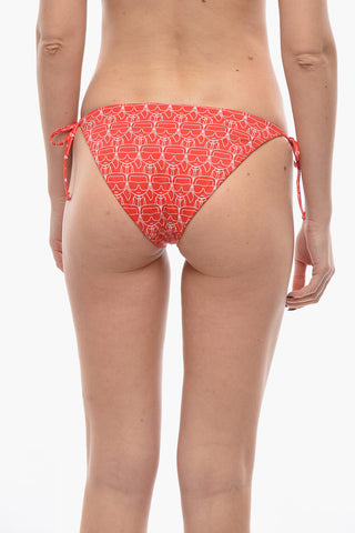 Bikini-Slip mit ikonischem Allover-Print und bindbaren Bändchen
