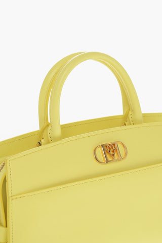 Leather MODE MENA Crossbody Bag with Golden-Effect Applied Log