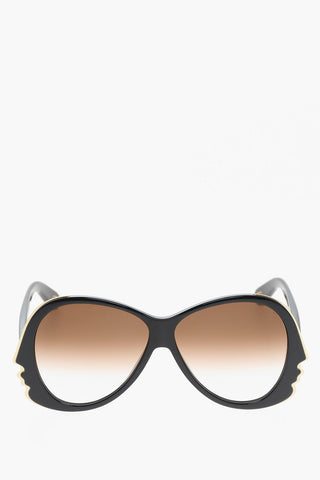 Sunglasses with Gradient Lenses and Golden Details