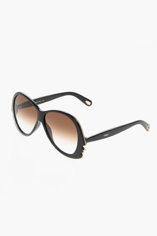 Sunglasses with Gradient Lenses and Golden Details