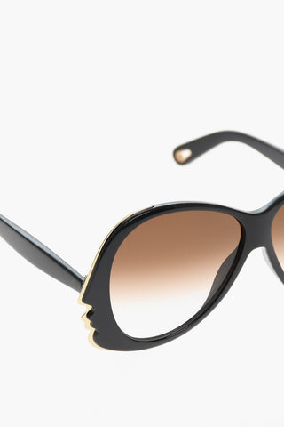 Sunglasses with Gradient Lenses and Golden Details