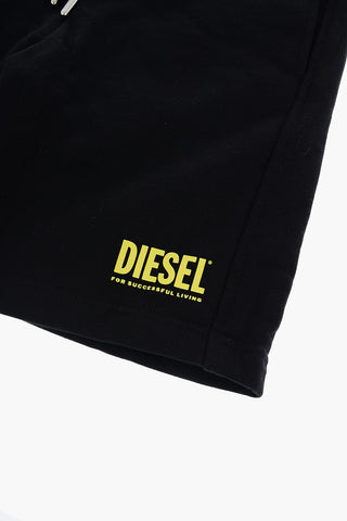 Shorts in Tinta Unita con Logo Stampato 