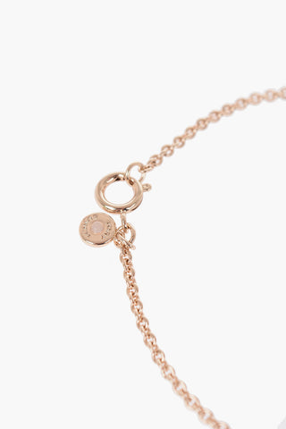 Collana Lunga Effetto Dorato con Decorazioni Iconiche