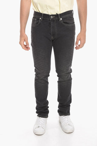 Taylor-fitting Stretchy Denims with MEDUSA PLAQUE Motif