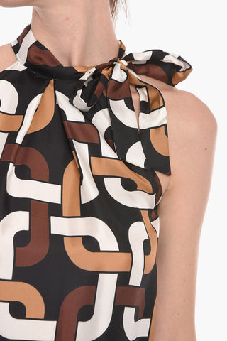 Top TARYN con Stampa Geometrica e Dettaglio da Allacciare