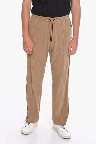 Pantaloni in velluto a coste con zip alla caviglia