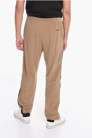 Pantaloni in velluto a coste con zip alla caviglia