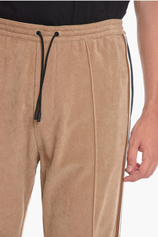 Pantaloni in velluto a coste con zip alla caviglia