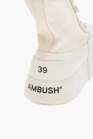 High-top VULCANISED Rubber and Leather Sneakers
