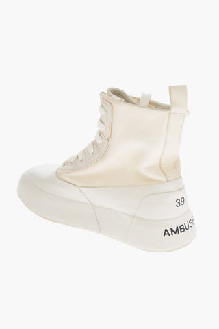 High-top VULCANISED Rubber and Leather Sneakers