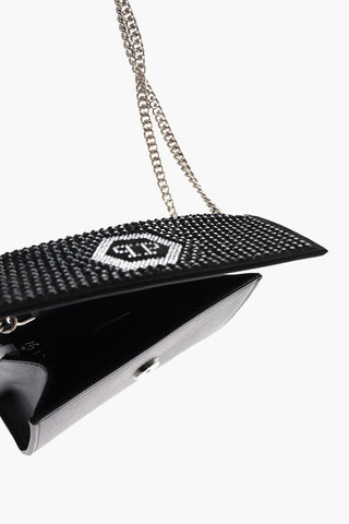faux leather shoulder bag with rhinestone embellishment