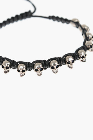 Bracciale in Cotone Cerato con Teschi in Ottone