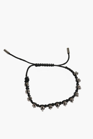 Solid Color Friendship Bracelet with Brass Skulls