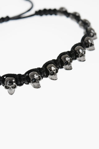 Solid Color Friendship Bracelet with Brass Skulls