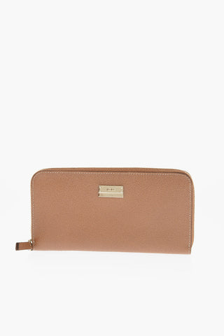 Leather wallet with gold logo tag