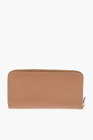 Leather wallet with gold logo tag