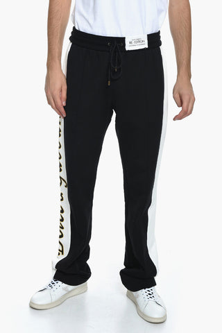 RE-EDITION Joggers a Una Pince con Logo Ricamato