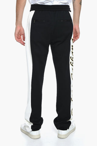 RE-EDITION Joggers a Una Pince con Logo Ricamato