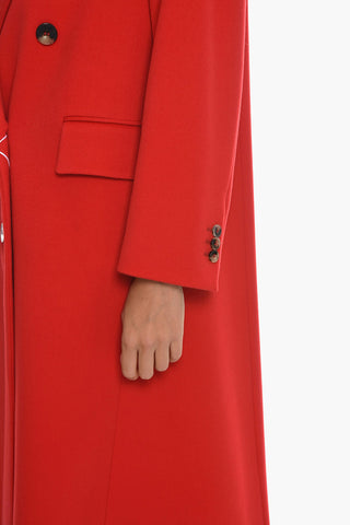 COUTURE Double-breasted Wool Coat with Peak Lapel
