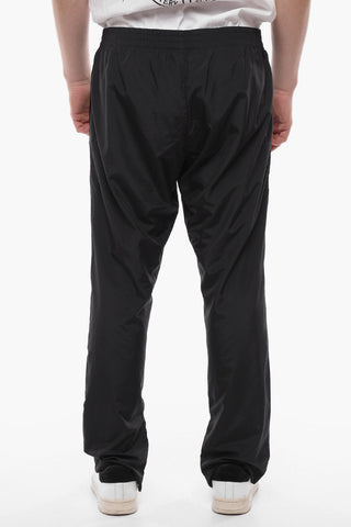 Solid Color Track Pants with Contrasting Details and Ankle Zip