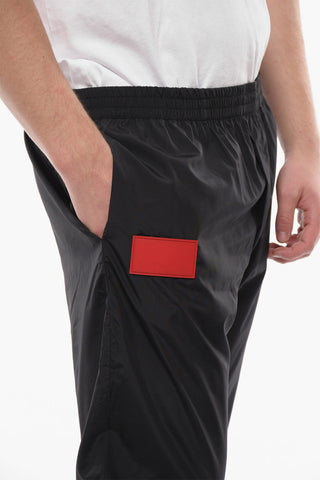 Solid Color Track Pants with Contrasting Details and Ankle Zip