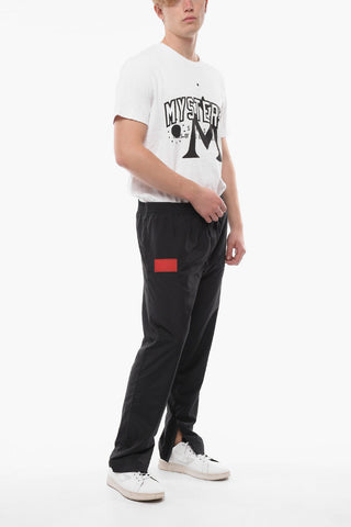 Solid Color Track Pants with Contrasting Details and Ankle Zip