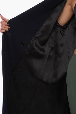 COUTURE Double-breasted Wool Coat with Peak Lapel