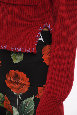 Asymmetrical Length Wool Turtleneck Sweater with Embroidered Logo