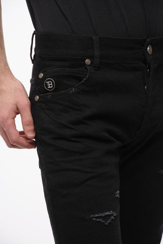 Slim-fitting Jeans with Distressed Detailing