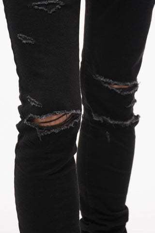 Slim-fitting Jeans with Distressed Detailing