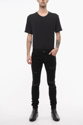 Slim-fitting Jeans with Distressed Detailing