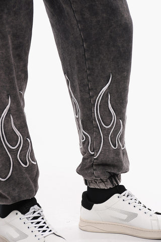 Joggers effetto acid wash con Ricami
