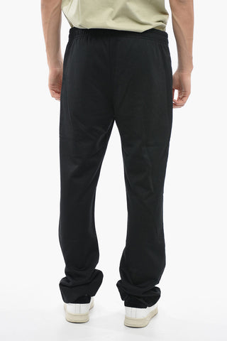 Joggers a una Pince in Tinta Unita