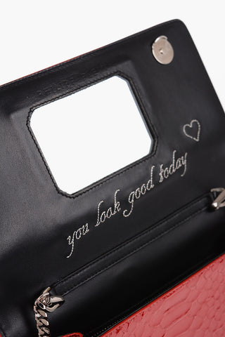 Crocodile Effect Patent Leather Clutch Decorated with Claw Rings
