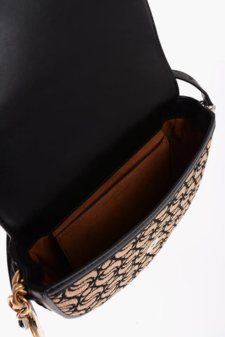 All-Over S-Wave Motif Fabric and Faux Leather Saddle Bag