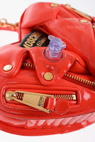 COUTURE! Borsa Biker in Ecopelle Lucida a Forma di Cuore con Design Gonfiabile e Tracolla a Catena Removibile