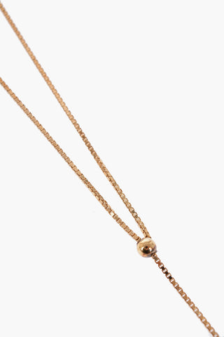 Long Golden Necklace with Ball Pendant