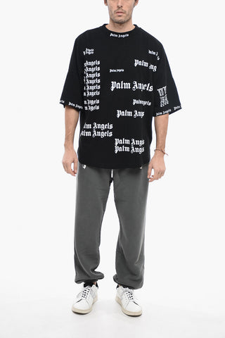 All-Over Logo Printed Oversized Crew-Neck T-shirt