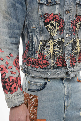 Distressed Denim Jacket with Skulls Print