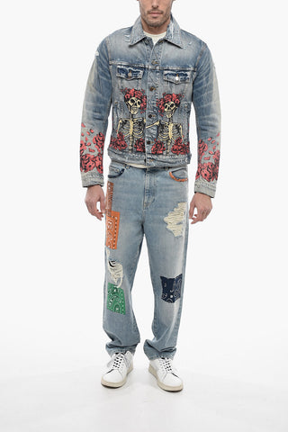 Distressed Denim Jacket with Skulls Print