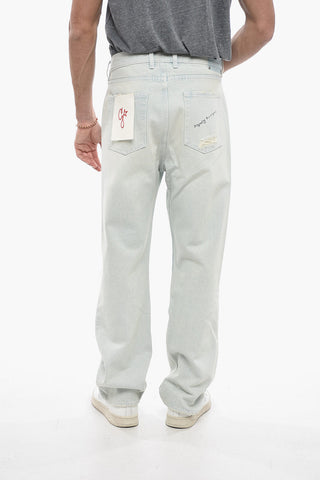 Wide-leg Distressed Denims with Delavé Effect and Lettering