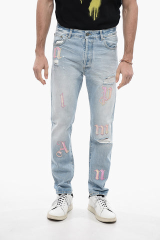 Jeans Distressed a Lavaggio Chiaro con Toppe