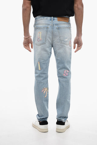 Jeans Distressed a Lavaggio Chiaro con Toppe