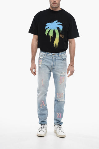 Jeans Distressed a Lavaggio Chiaro con Toppe